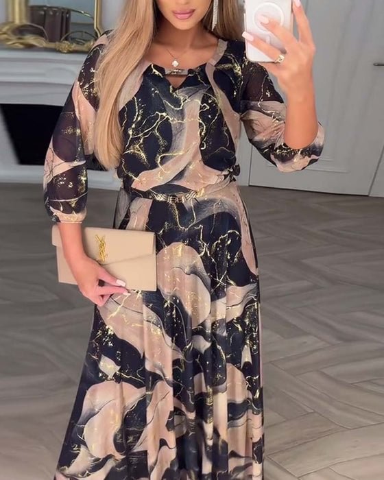 Robe élégante en chiffon imprimé avec manches trois-quarts