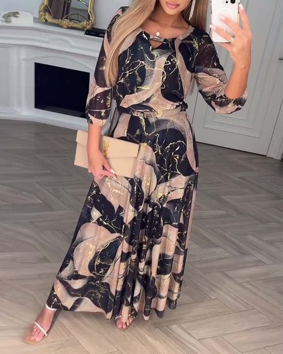 Robe élégante en chiffon imprimé avec manches trois-quarts