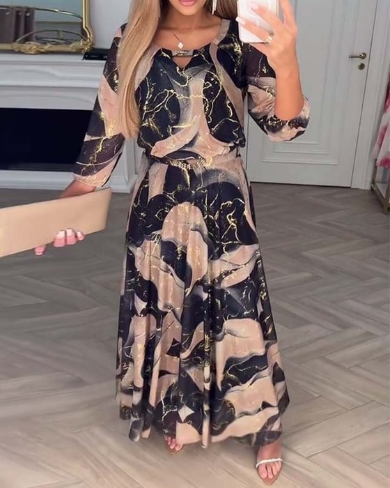 Robe élégante en chiffon imprimé avec manches trois-quarts